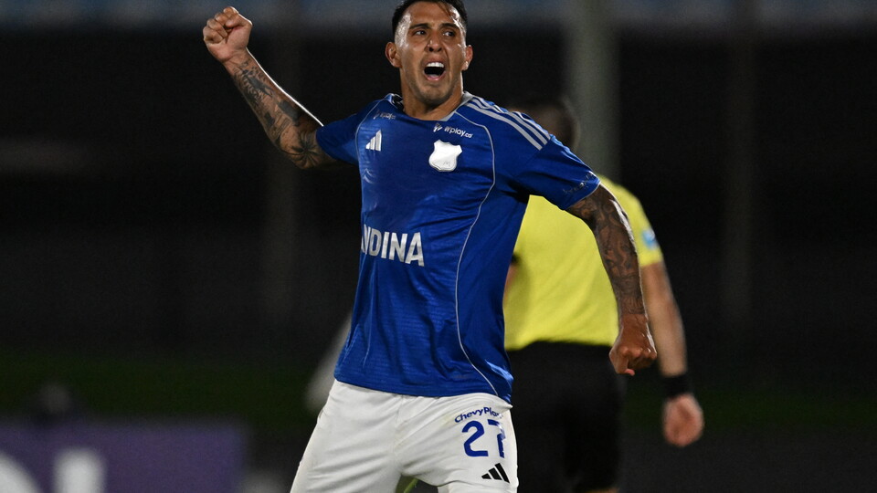Rodrigo Contreras comemora gol do Millonarios contra o Boston River. Foto: Eitan ABRAMOVICH / AFP